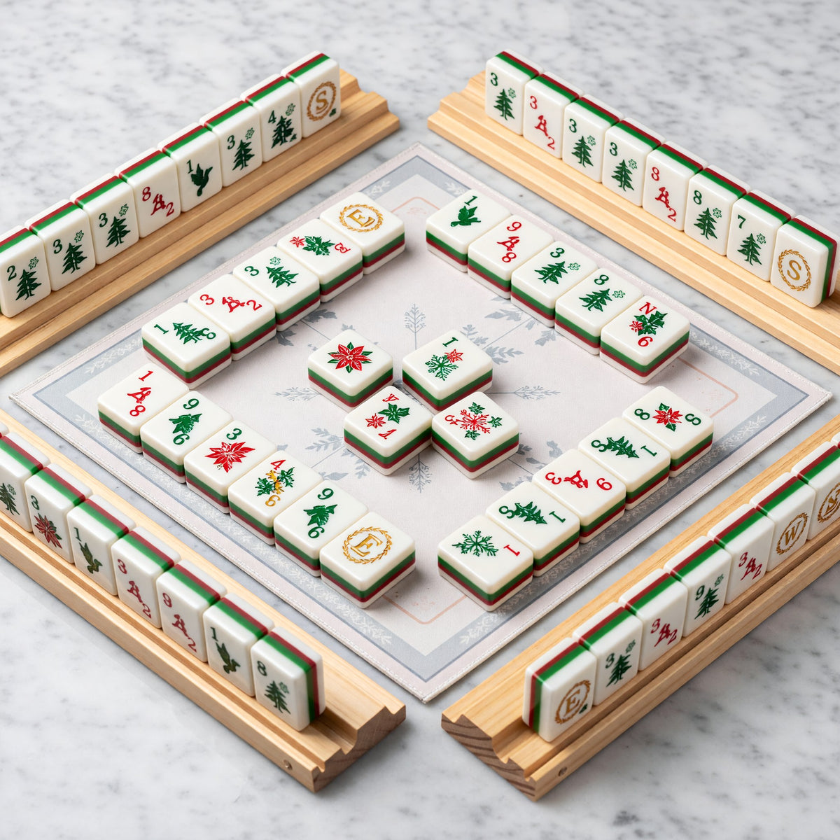 Christmas Mahjong Tiles Set – Reindeer Snowflakes Poinsettia Tree – tiles on game table